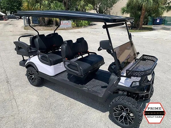White Aluma 6 Passenger Lifted Golf Cart affordable golf cart rental, golf cart rent isle of palms golf cart rental